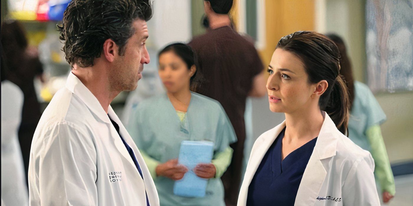 Patrick Dempsey and Caterina Scorsone as Derek and Amelia Shepherd, looking at each other intensely in Grey's Anatomy