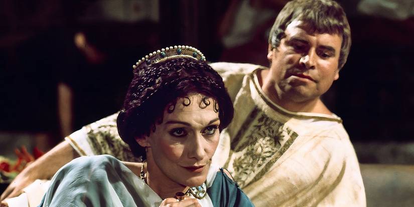 An Ancient Roman woman and man reclining in 'I, Claudius'.
