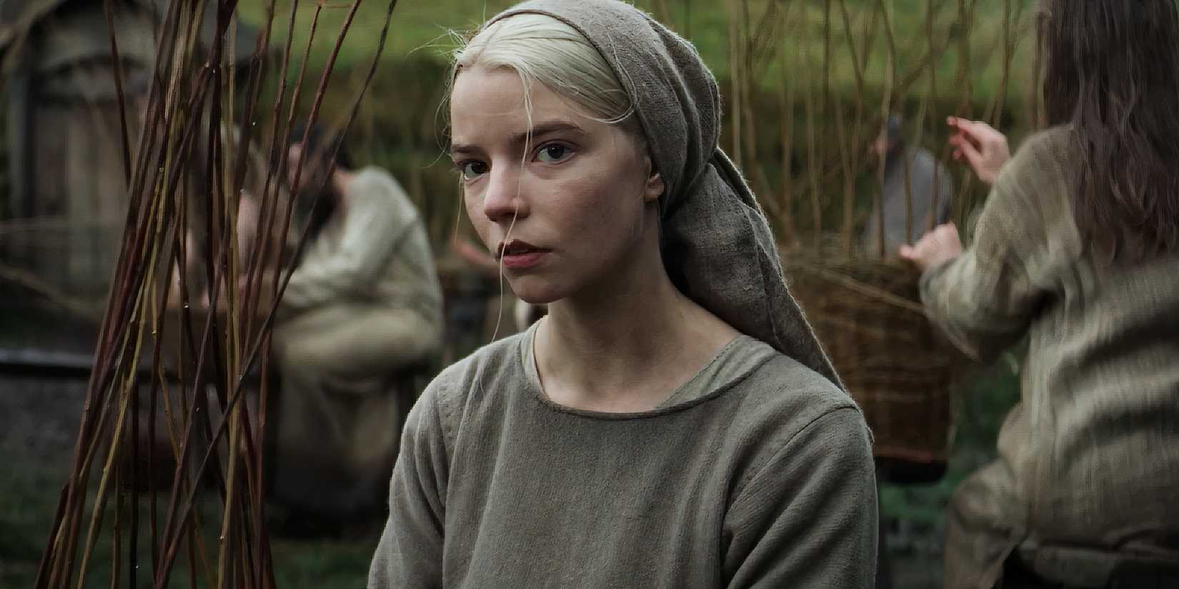 Anya Taylor-Joy as Olga working in the field in The Northman.