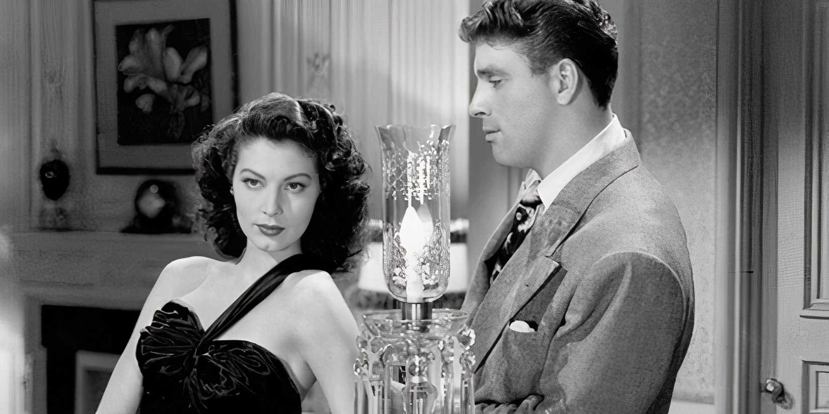 Ava Gardner leaning against a piano with Burt Lancaster standing behind her in The Killers (1946).