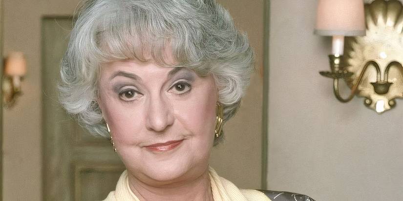 Bea Arthur as Dorothy Zbornak looking at the camera in The Golden Girls