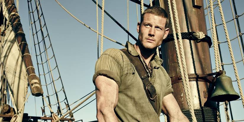 Tom Hopper as Billy Bones gazing into the distance from a ship in Black Sails
