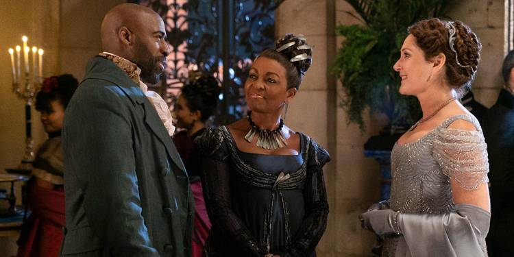 Daniel Francis, Adjoa Andoh, and Ruth Gemmell at a ball in Bridgerton Season 3 Episode 3