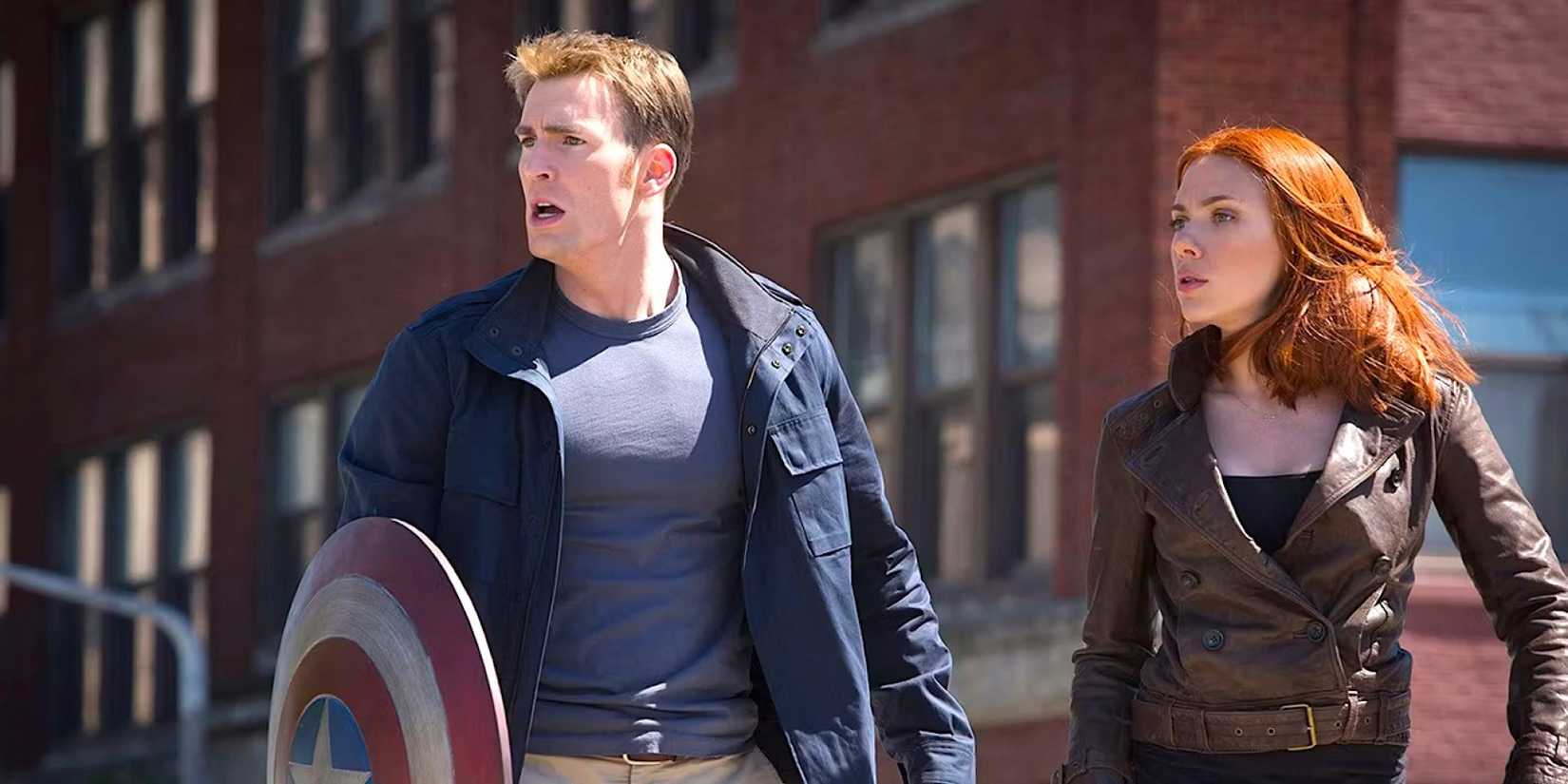 Captain America and Black Widow catch their breath in the middle of a street fight 