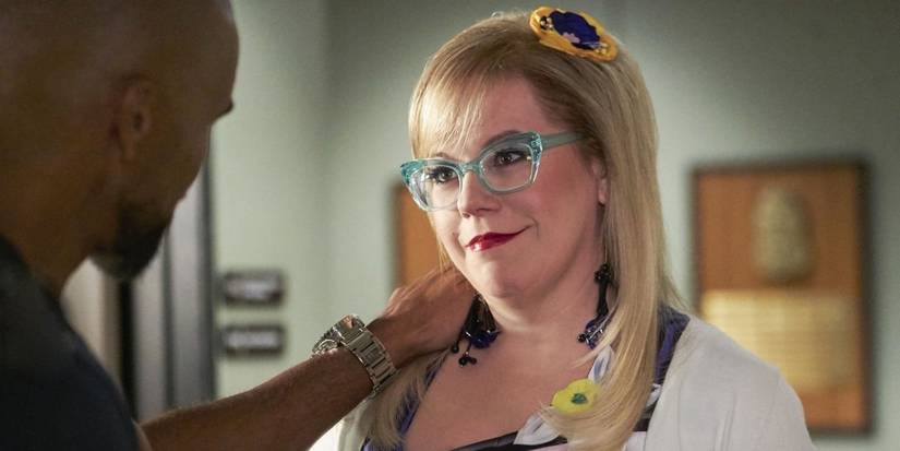 Kirsten Vangsness smiling at Shemar Moore in Criminal Minds Season 12