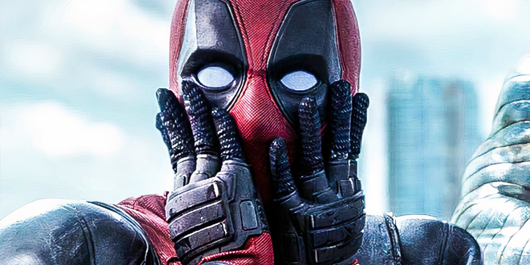 Masked vigilante Deadpool, played by actor Ryan Reynolds, poses with his hands over his mouth in mock surprise in 2016’s ‘Deadpool.’