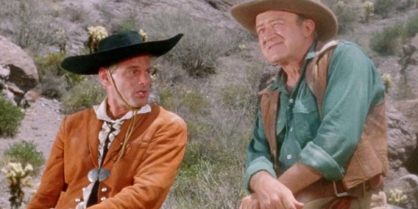 Two cowboys on horseback in color on Death Valley Days.
