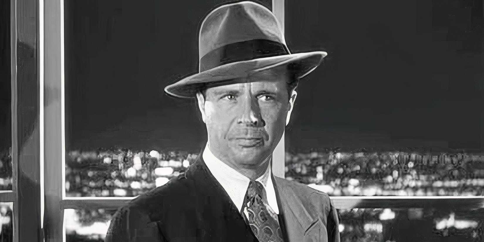 Dick Powell wearing a hat inside a high-rise building in Murder, My Sweet (1944)