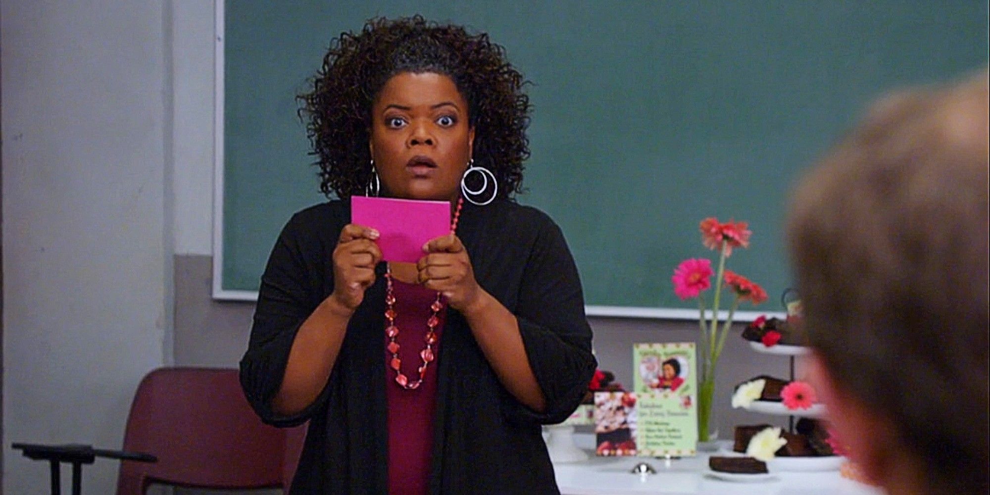 Shirley Bennett, played by Yvette Nicole Brown, giving a presentation in Community
