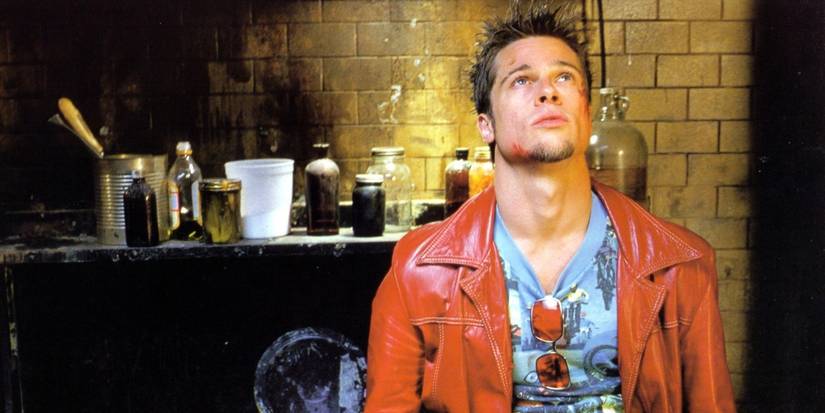Brad Pitt's Tyler Durden looking up in front of his soap-making set-up in Fight Club.