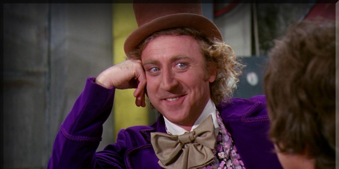 Willy Wonka, played by Gene Wilder, smiles at a child in 'Willy Wonka & the Chocolate Factory'.