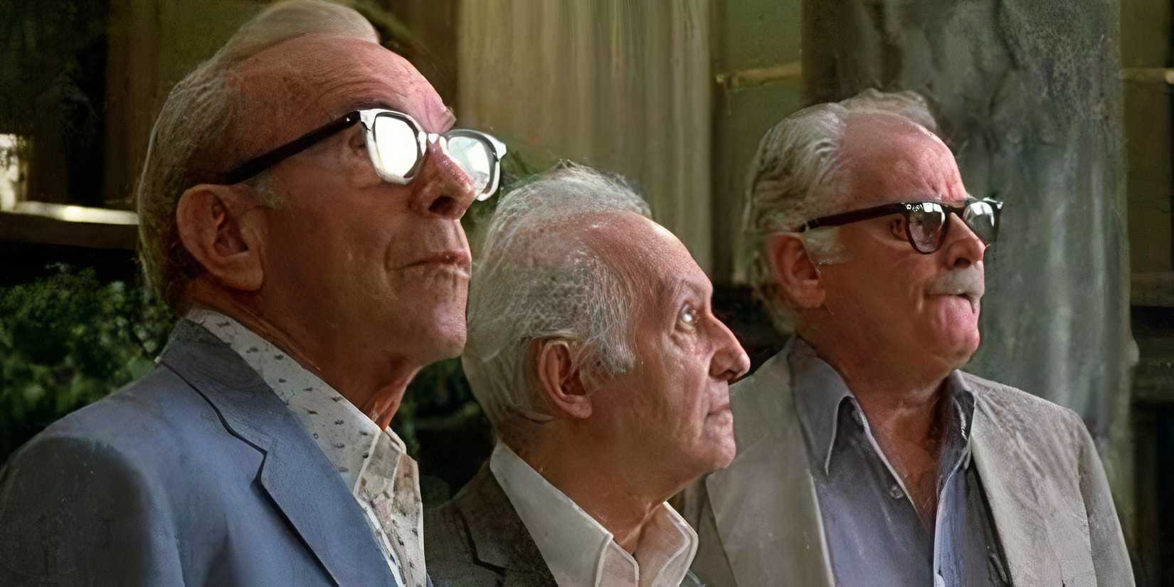 George Burns, Lee Strasberg and Art Carney all standing next to each other looking up in Going in Style (1979)