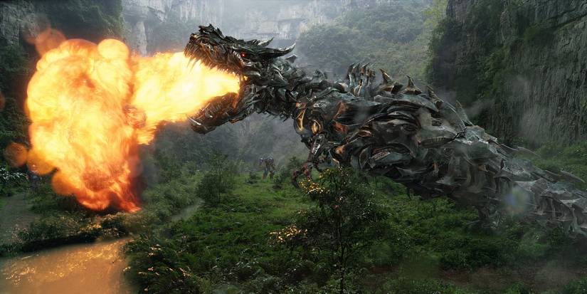 Grimlock, which looks like a T-Rex, spitting fire in Transformers: Age of Extinction