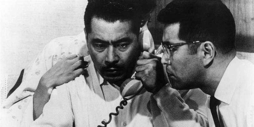 Toshirō Mifune as Kingo Gondo and Tatsuya Nakadai as Chief Inspector Tokura listening in on a phone call in High and Low