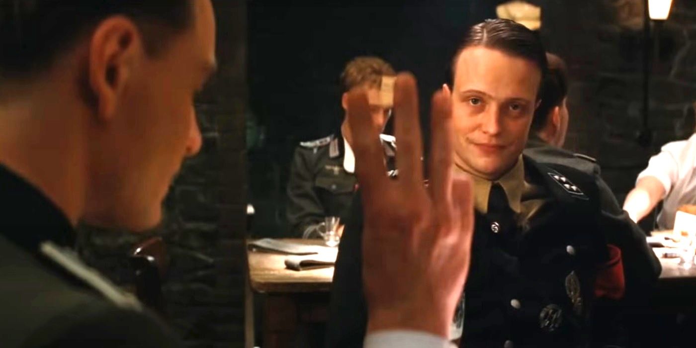 August Diehl notices Michael Fassbender holding up three fingers in Inglourious Basterds