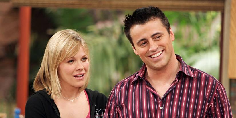 Matt LeBlanc and Andrea Anders as Joey Tribbiani and Alexis "Alex" Garrett, standing next to each other and smiling in Joey