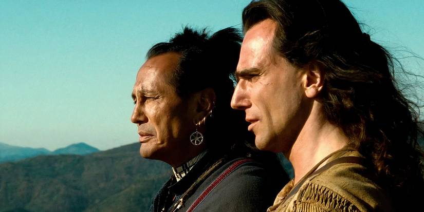 Daniel Day-Lewis and Russell Means stand on a cliff's edge in Michael Mann's 'The Last of the Mohicans'
