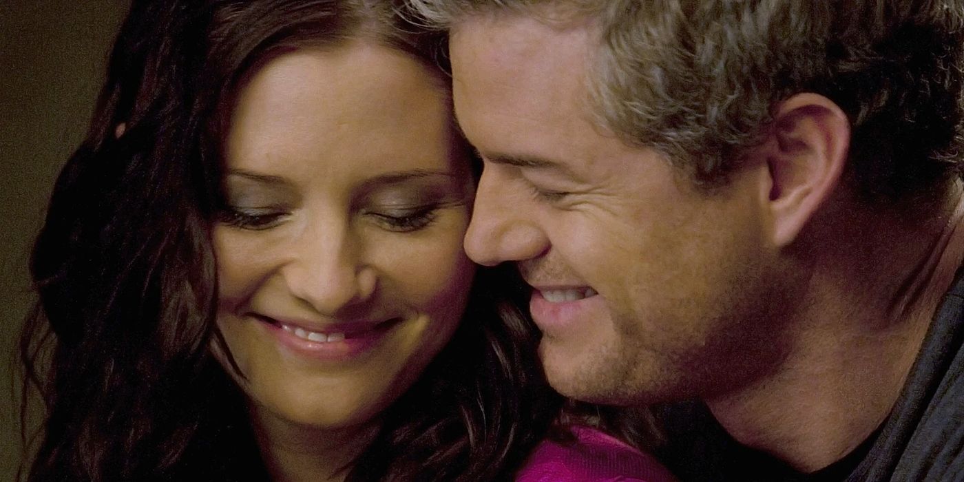 Mark Sloan and Lexie Grey from Grey's Anatomy smiling at one another. 