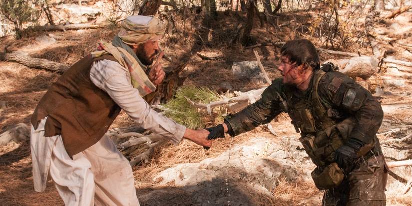 Mark Wahlberg's Marcus Luttrell coming out of water in Lone Survivor