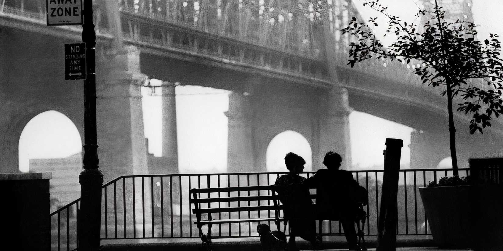Man and woman sitting on bench under Brooklyn bridge in 'Manhattan' 