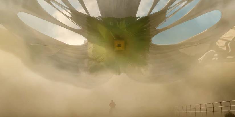 OJ Haywood, played by actor Daniel Kaluuya, rides away on a horse from the alien Jean Jacket in Nope