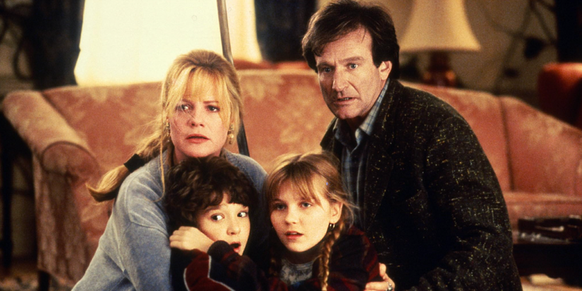 Robin Williams, Kirsten Dunst, Bonnie Hunt, and Bradley Pierce looking ahead in fear in Jumanji (1995)