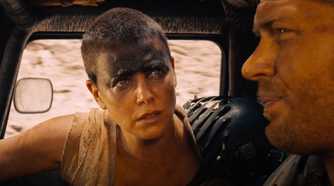 Furiosa talking to Max inside a car in Mad Max: Fury Road (2015).