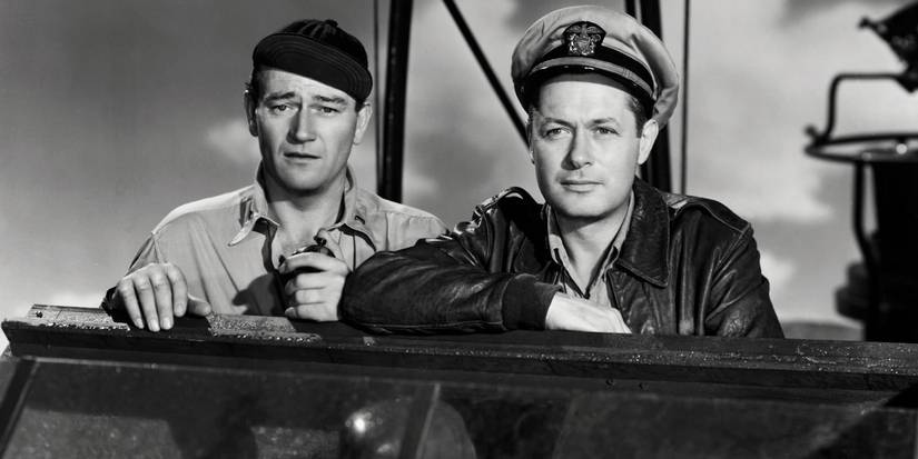 John Wayne dan Robert Montgomery dalam Mereka Dapat Dibuang
