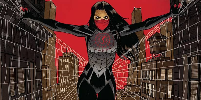 Silk with her arms spread and a web behind her.