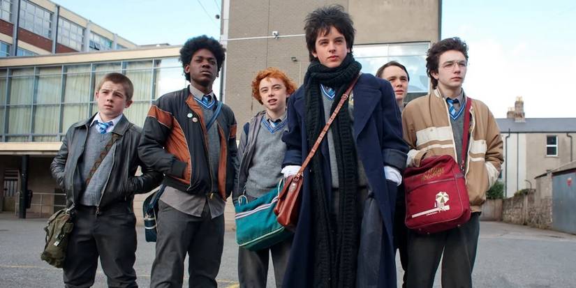 The cast of Sing Street on the street looking ahead