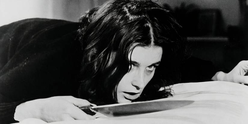 Margot Kidder holding a knife in Sisters 1972