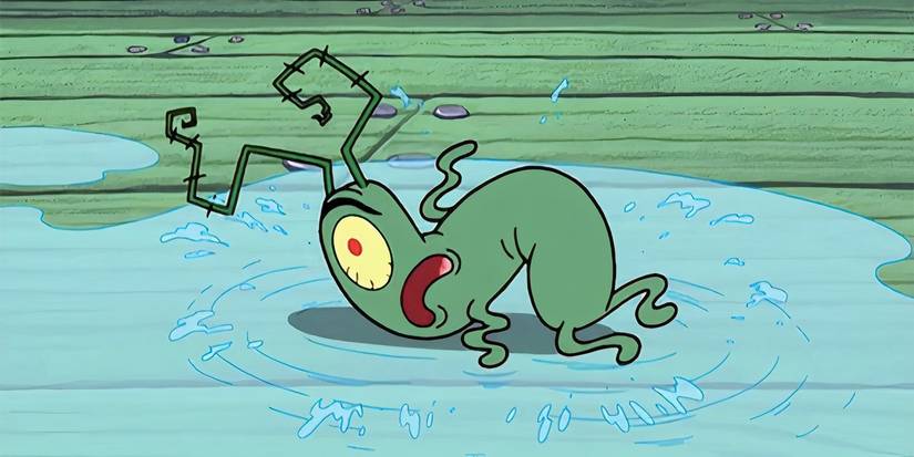 Plankton crumpled and in pain in a puddle of water on the floor of the Krusty Krab in SpongeBob SquarePants.