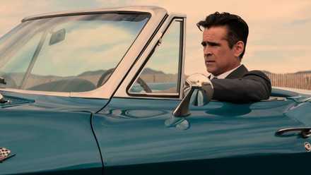 Colin Farrell as private detective John Sugar driving his blue convertible Corvette in L.A. in Sugar