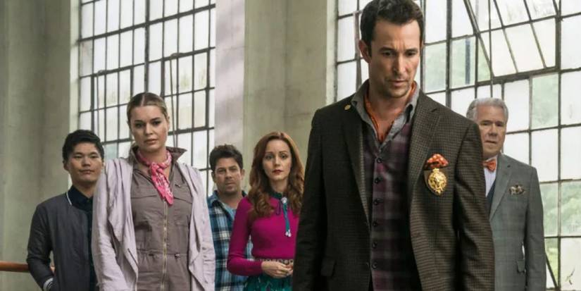 The cast of The Librarians TV series looking intently in the same direction