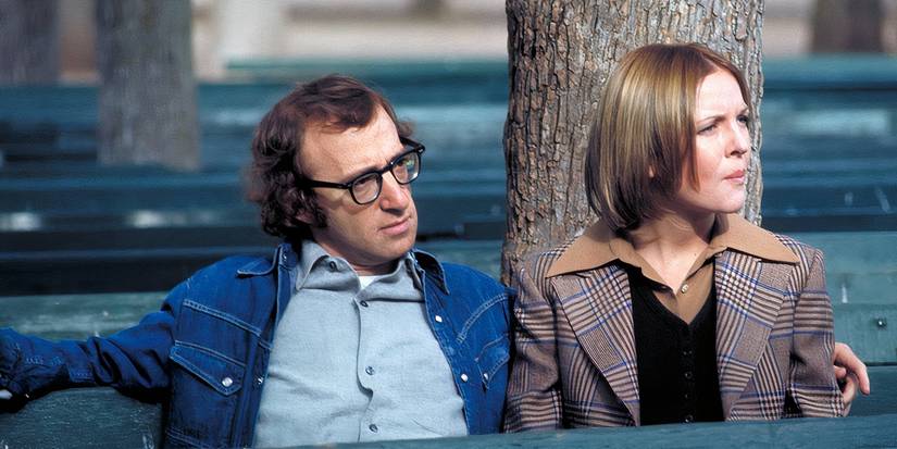 Woody Allen and Diane Keaton on a bench in front of a tree in 'Play It Again, Sam'