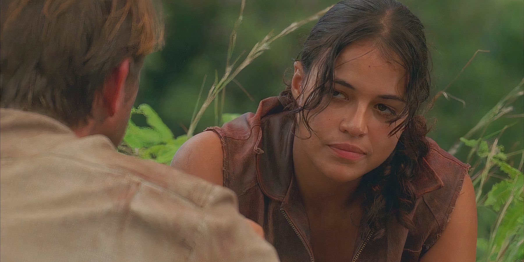 Ana Lucia (played by Michelle Rodriguez), confronts the imposter Goodwin (Brett Cullen), with a stoic look on her face in Lost’s Season 2 Episode ‘The Other 48 Days.’