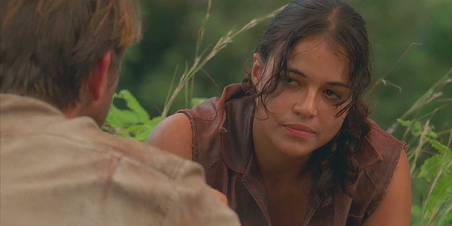 Ana Lucia (played by Michelle Rodriguez), confronts the imposter Goodwin (Brett Cullen), with a stoic look on her face in Lost’s Season 2 Episode ‘The Other 48 Days.’