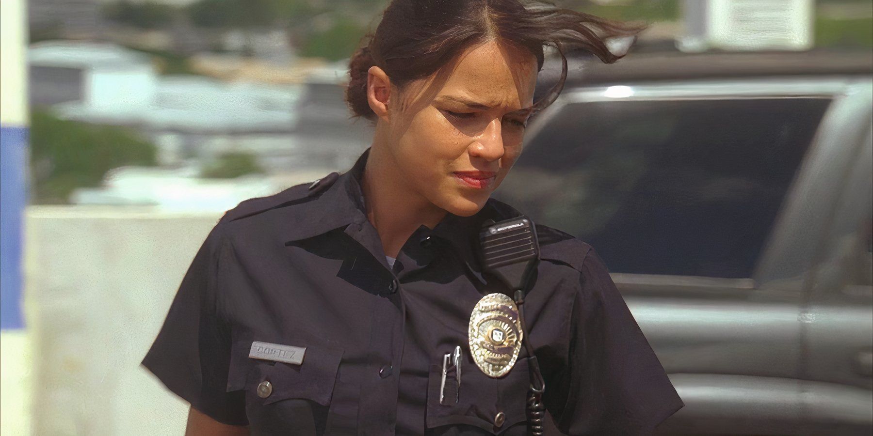 Ana Lucia (played by Michelle Rodriguez), leaves her squad car in her police uniform in Lost’s Season 2 Episode ‘Two for the Road.’