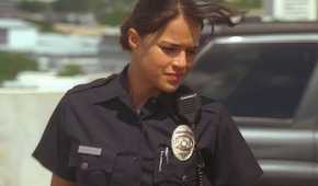 Ana Lucia (played by Michelle Rodriguez), leaves her squad car in her police uniform in Lost’s Season 2 Episode ‘Two for the Road.’