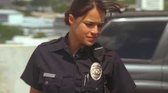Ana Lucia (played by Michelle Rodriguez), leaves her squad car in her police uniform in Lost’s Season 2 Episode ‘Two for the Road.’