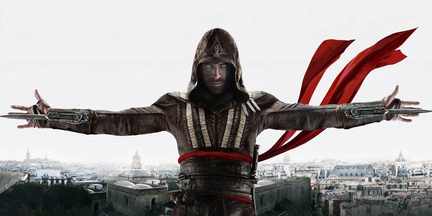 Aguilar stands with his arms outstretched, his hidden blades extended & right ring finger missing 