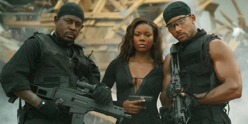 Martin Lawrence, Gabrielle Union & Will Smith hold firearms in police gear in Bad Boys II