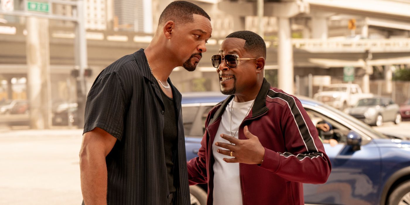 Mike and Marcus talking outside of their car under an overpass in Bad Boys: Ride or Life.