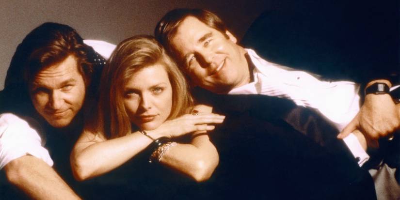 Jack (Jeff Bridges), Susie (Michelle Pfiffer), and Frank (Beau Bridges) are laying on one another, looking directly into the camera lens.
