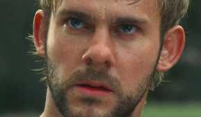 Charlie (played by Dominic Monaghan), looks into the distance with dread