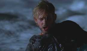 Charlie (played by Dominic Monaghan), splutters, drenched in ocean surf after being beaten by John Locke in Lost’s Season 2 Episode Fire + Water