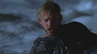 Charlie (played by Dominic Monaghan), splutters, drenched in ocean surf after being beaten by John Locke in Lost’s Season 2 Episode Fire + Water