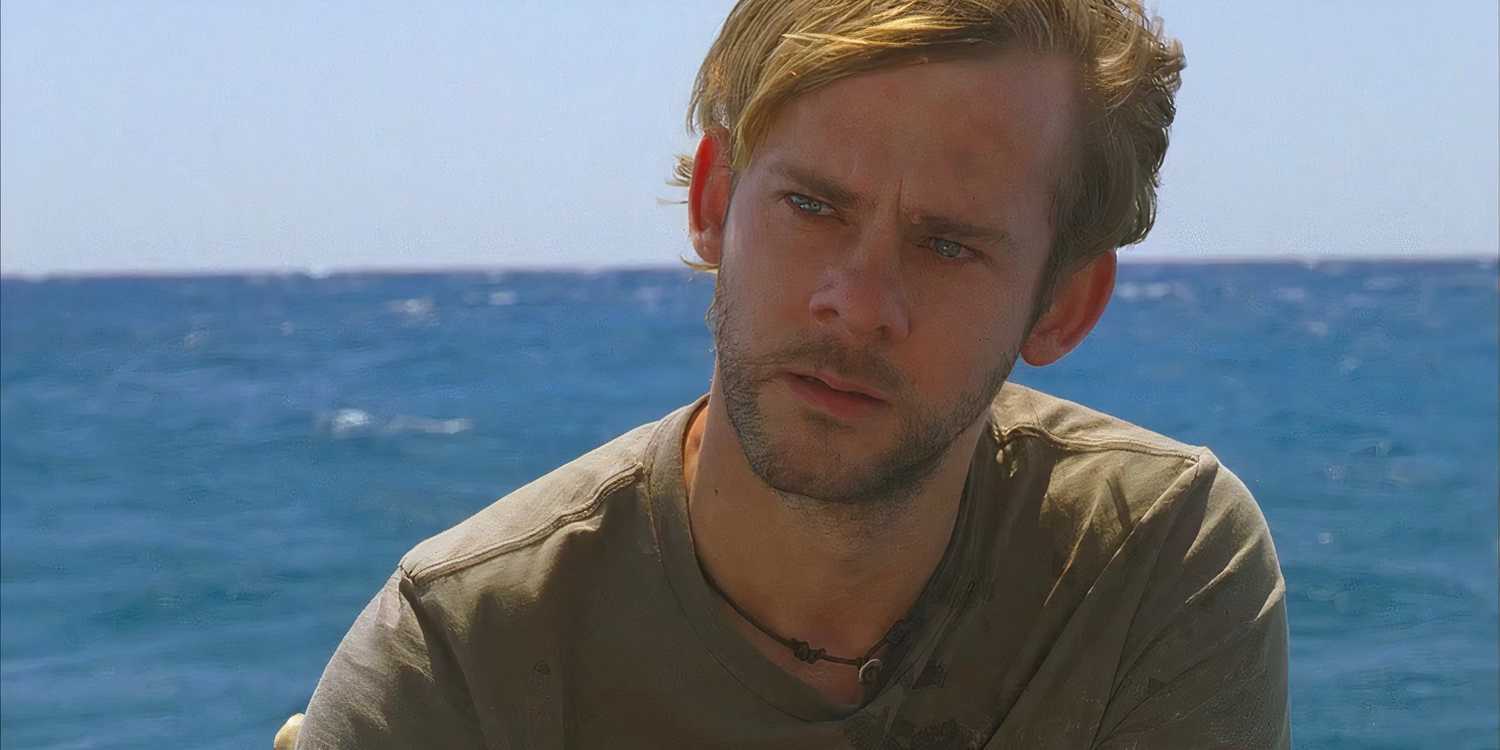 Charlie (Dominic Monaghan), begins to cry on the beach
