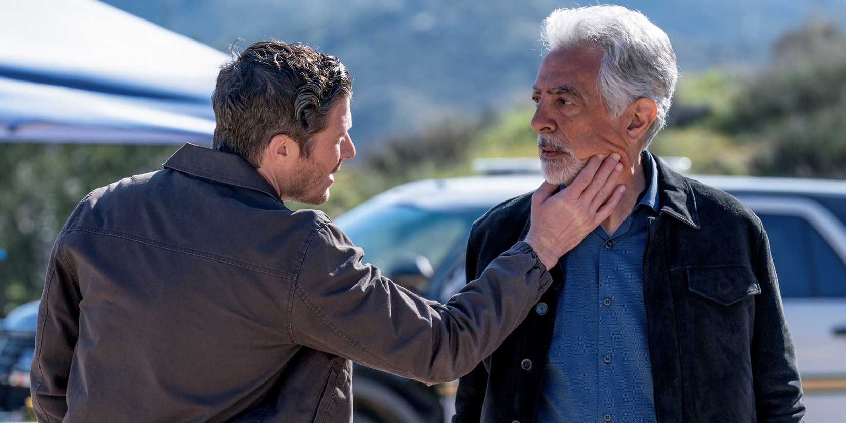 Zach Gilford as Elias Voit grabbing the neck of Joe Mantegna as David Rossi in Criminal Minds: Evolution