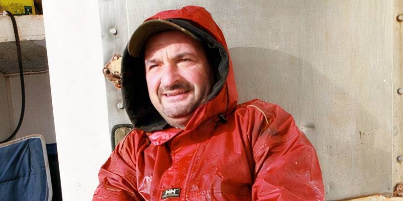 'Deadliest Catch' star Nick Mavar leaning against the ship